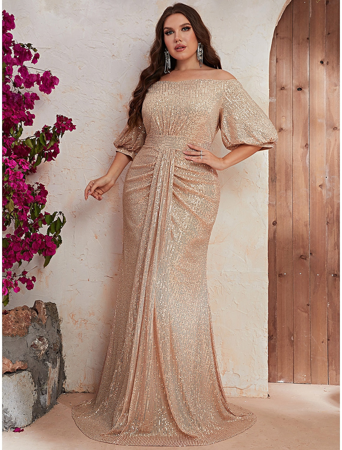 Back view of the sophisticated A-line evening gown with delicate beading.