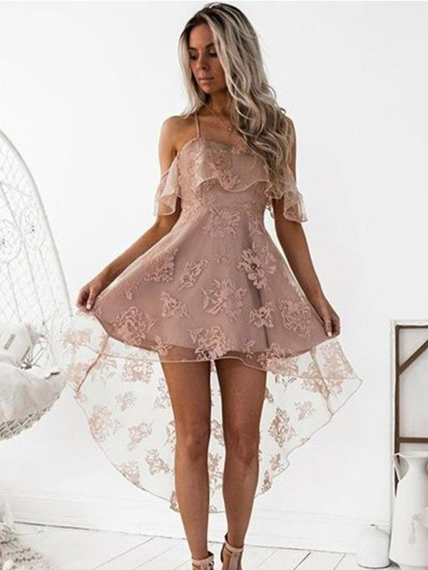 Woman wearing a white A-line off-shoulder lace mini dress.