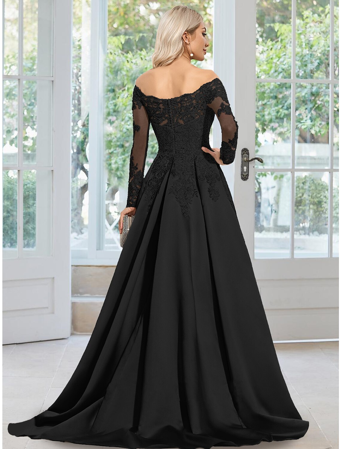 Back view of the A-line evening gown, showcasing the court train and floral details.