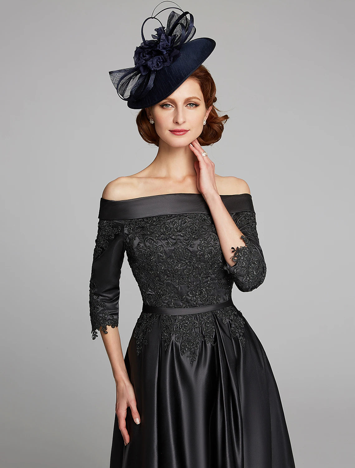 Model showcasing the flow and fit of the A-line tea length dress.