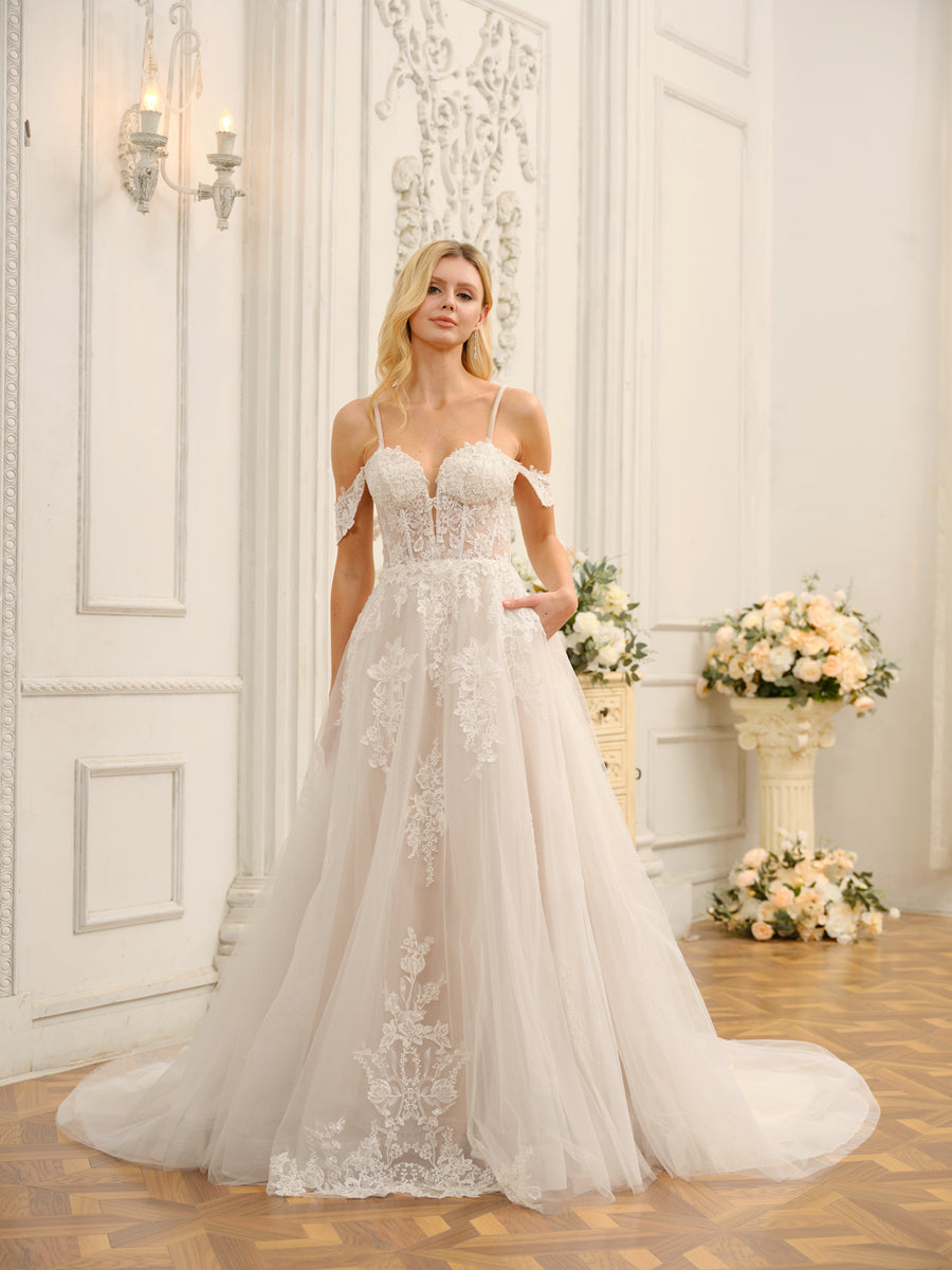 Side profile of the elegant Weitese bridal gown with flowing skirt.