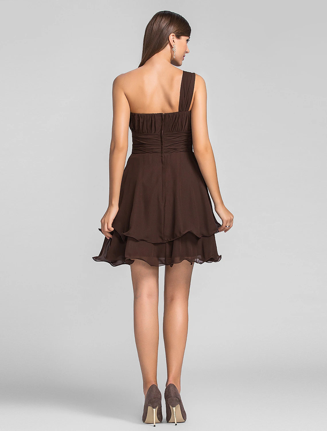 Model posing in the Weitese one-shoulder chiffon mini dress, showing the back detail.