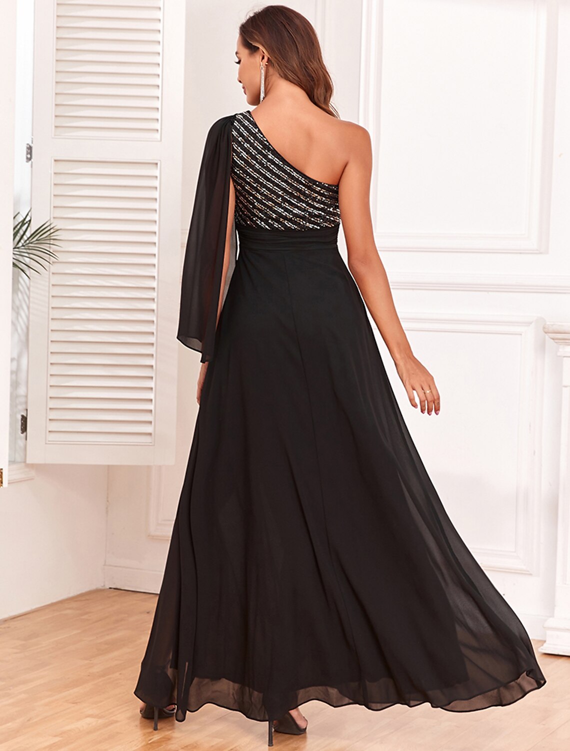 Back view of the Weitese A-Line one-shoulder long sleeve evening gown, showcasing the elegant silhouette.