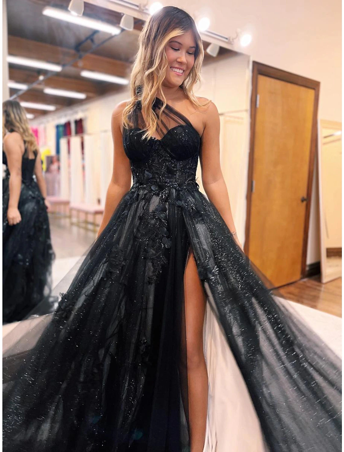 Back view of the Weitese A-Line prom dress, showcasing the backless design and sweep train.