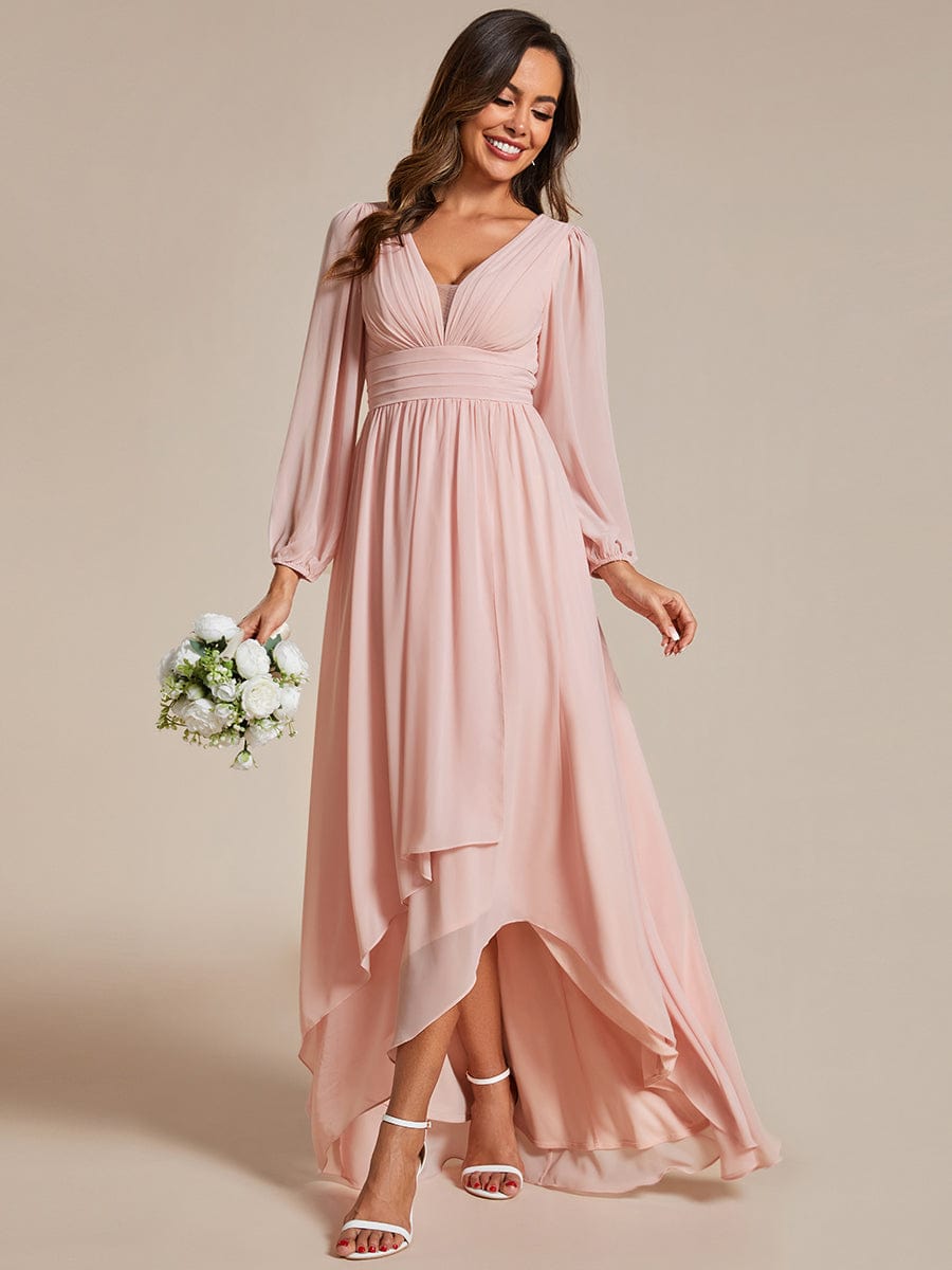 Model wearing a pink Weitese A-line pleated chiffon midi bridesmaid dress.