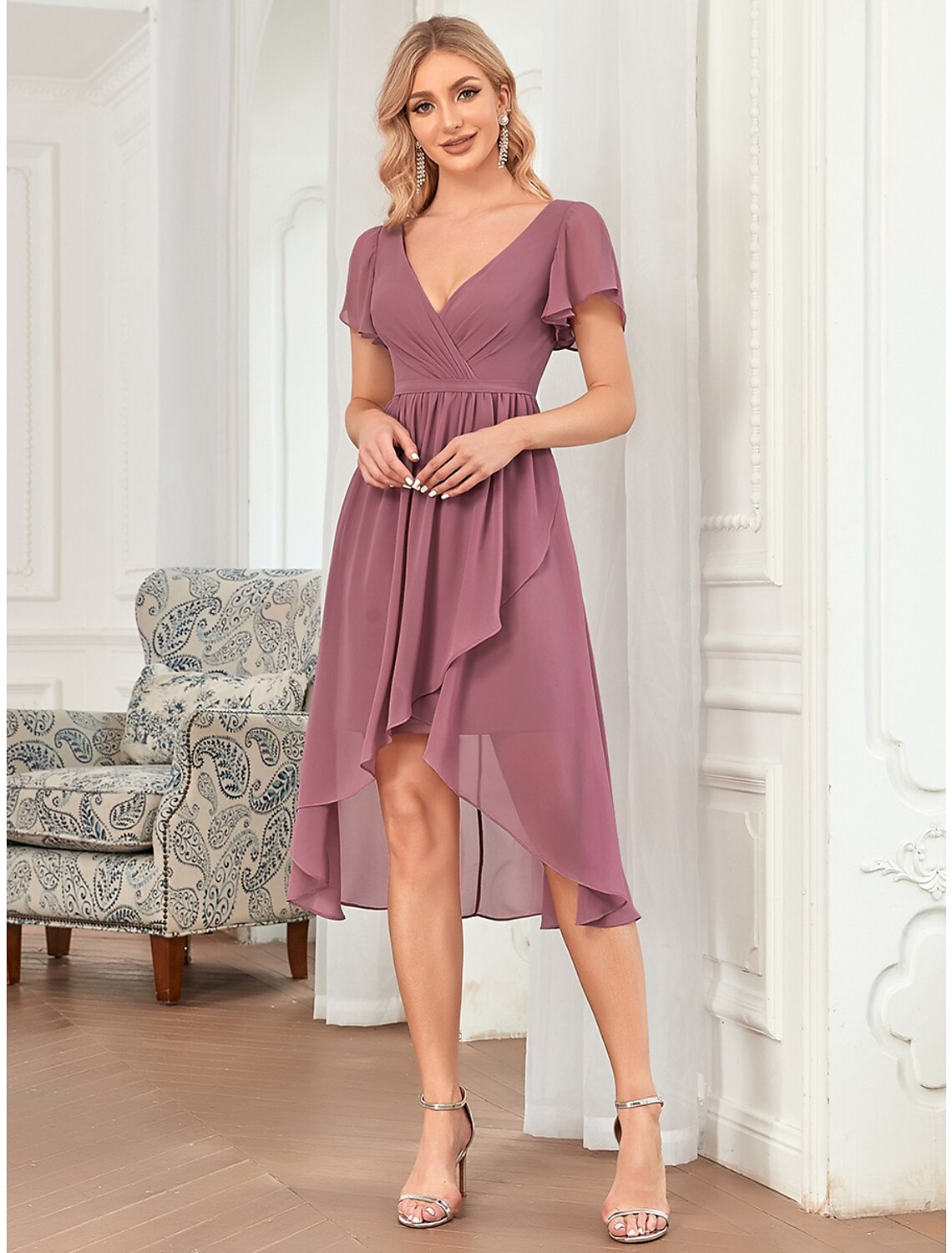 Back view of the elegant A-line plunging neck pleated bridesmaid dress.