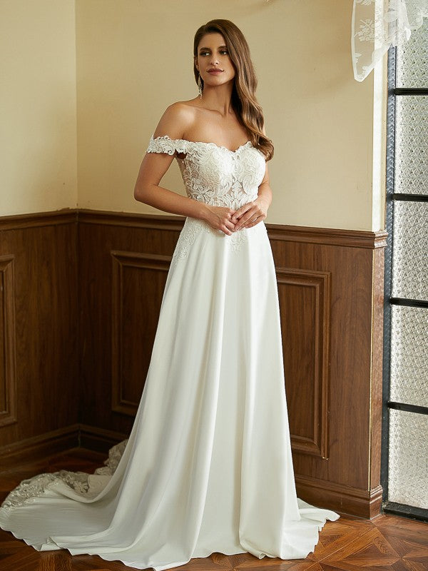 Model wearing Weitese A-Line Princess wedding dress with off-shoulder lace and short sleeves, front view.