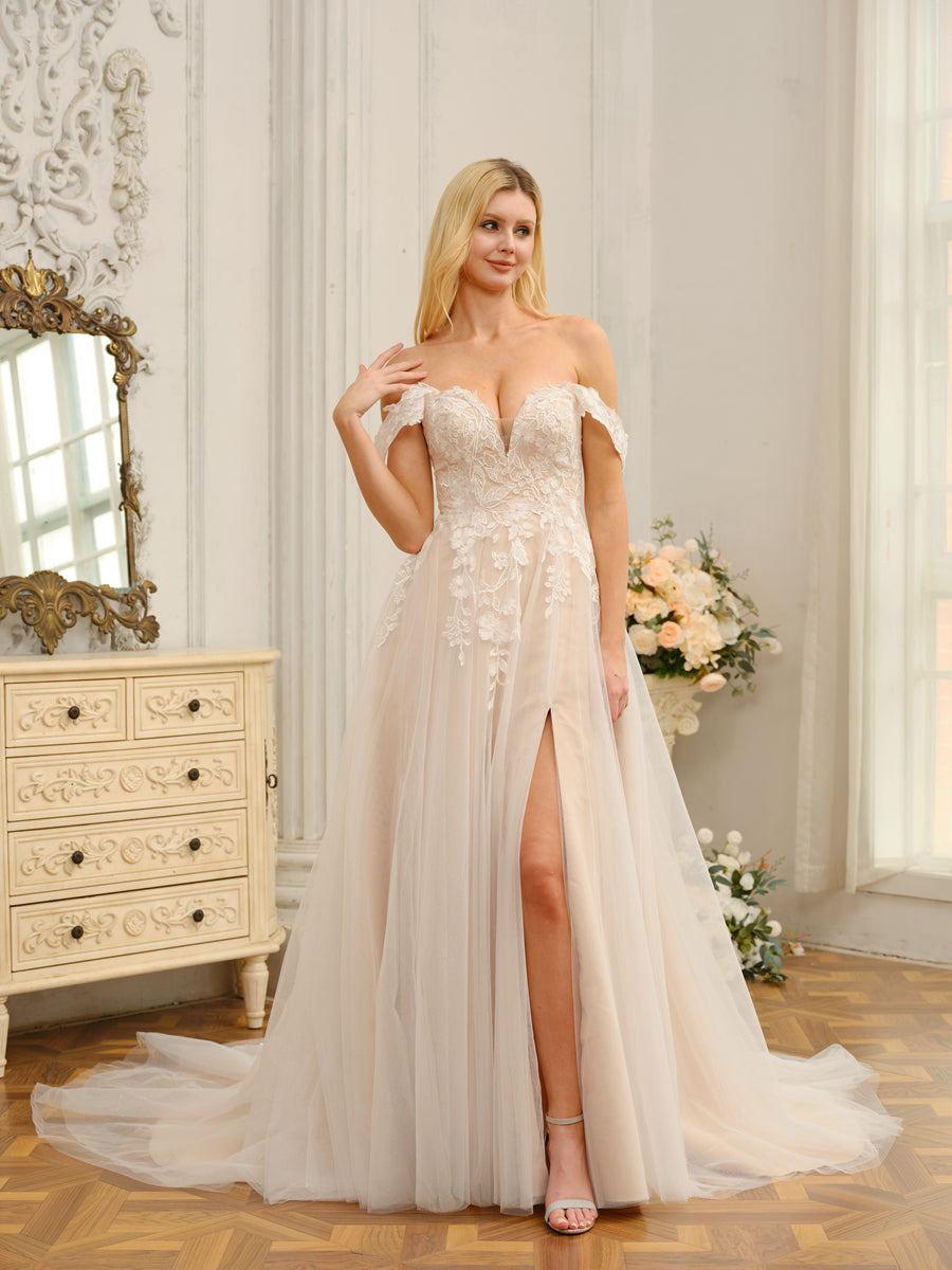 Close-up of delicate appliques on the Weitese wedding dress.