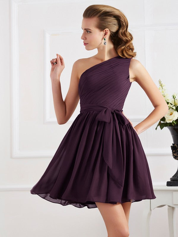 Model wearing an elegant A-line one-shoulder pleated chiffon short bridesmaid dress.