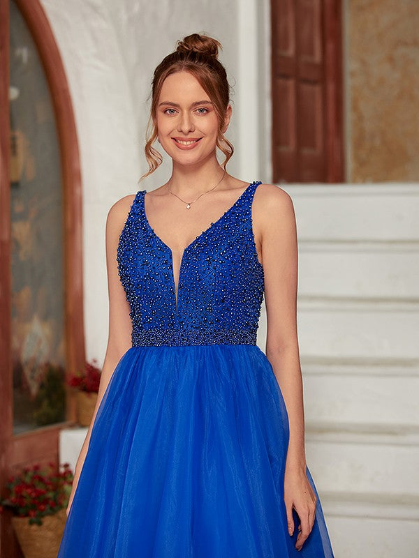 Flowing organza skirt of the A-line princess gown.