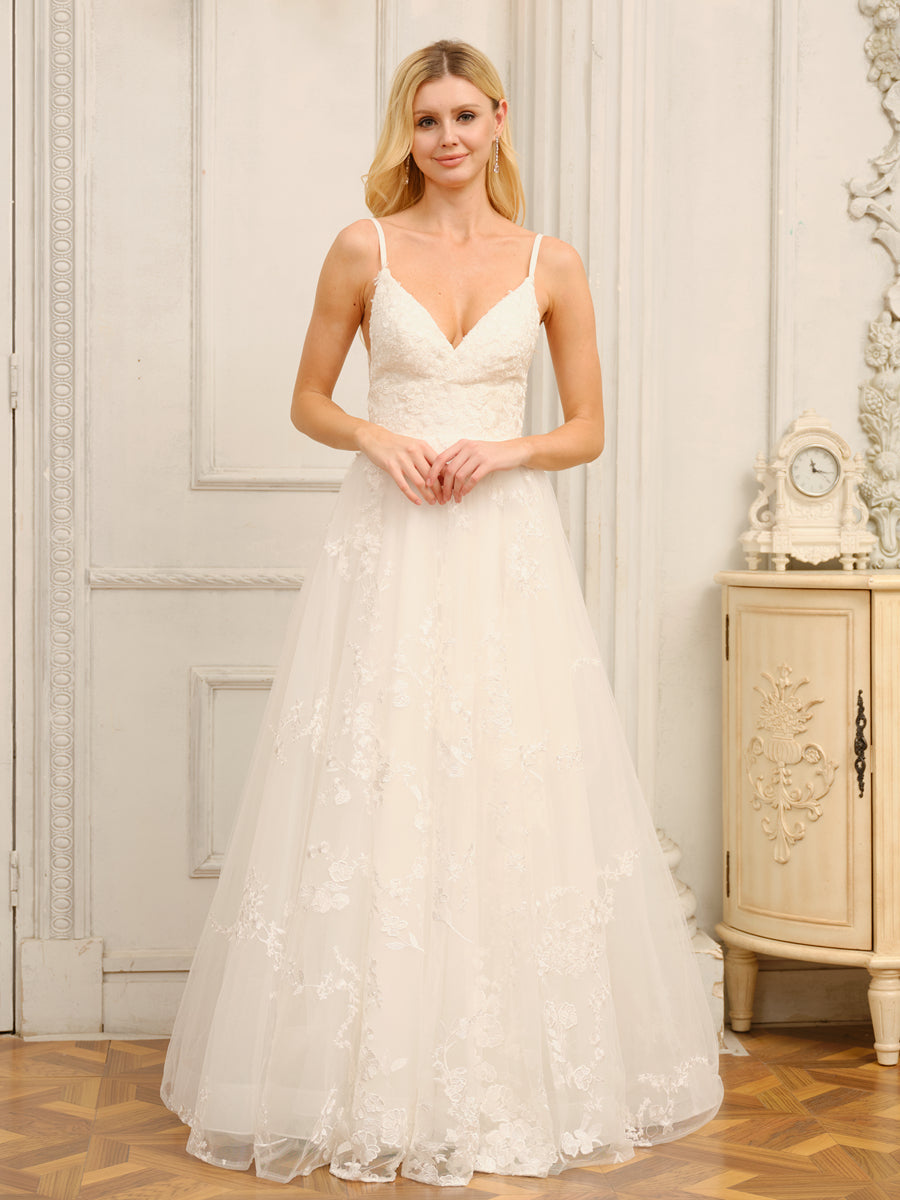 Full view of a white A-Line Princess wedding dress with spaghetti straps and V-neck, featuring appliques.