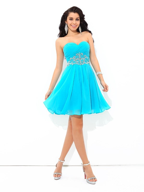 Back view of the pleated A-Line sweetheart cocktail dress.