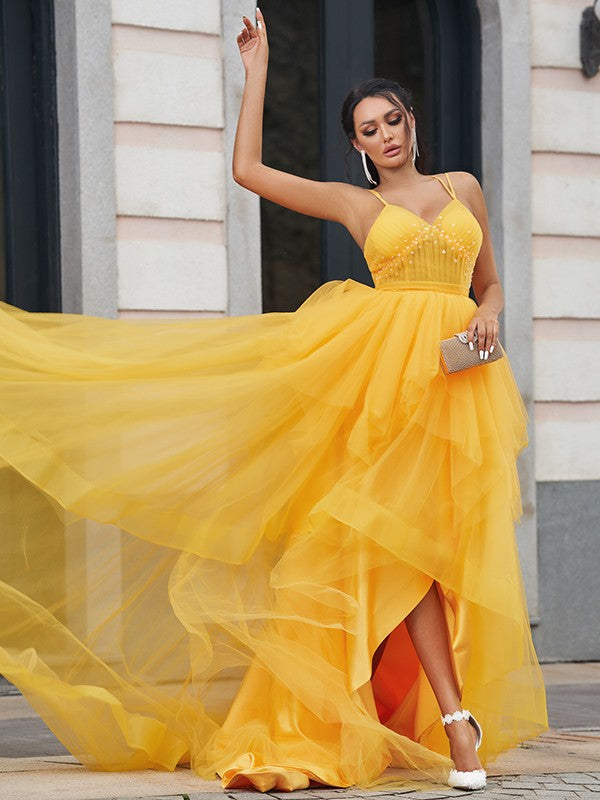 Back view of a V-Neck Sleeveless Prom Dress with flowing tulle.