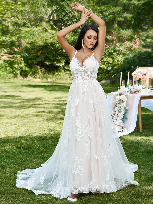 Model wearing a Weitese A-Line Princess V-neck lace wedding dress with a sweep train.