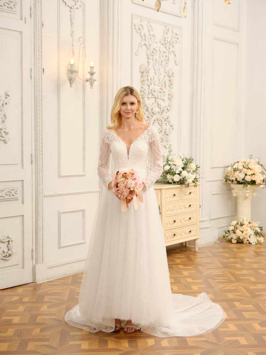 Full view of a bride in the elegant Weitese A-line Princess V-neck long lace wedding dress.