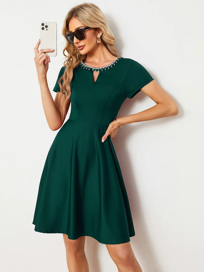 Model walking in a Weitese A-line mini dress, highlighting its casual flow.
