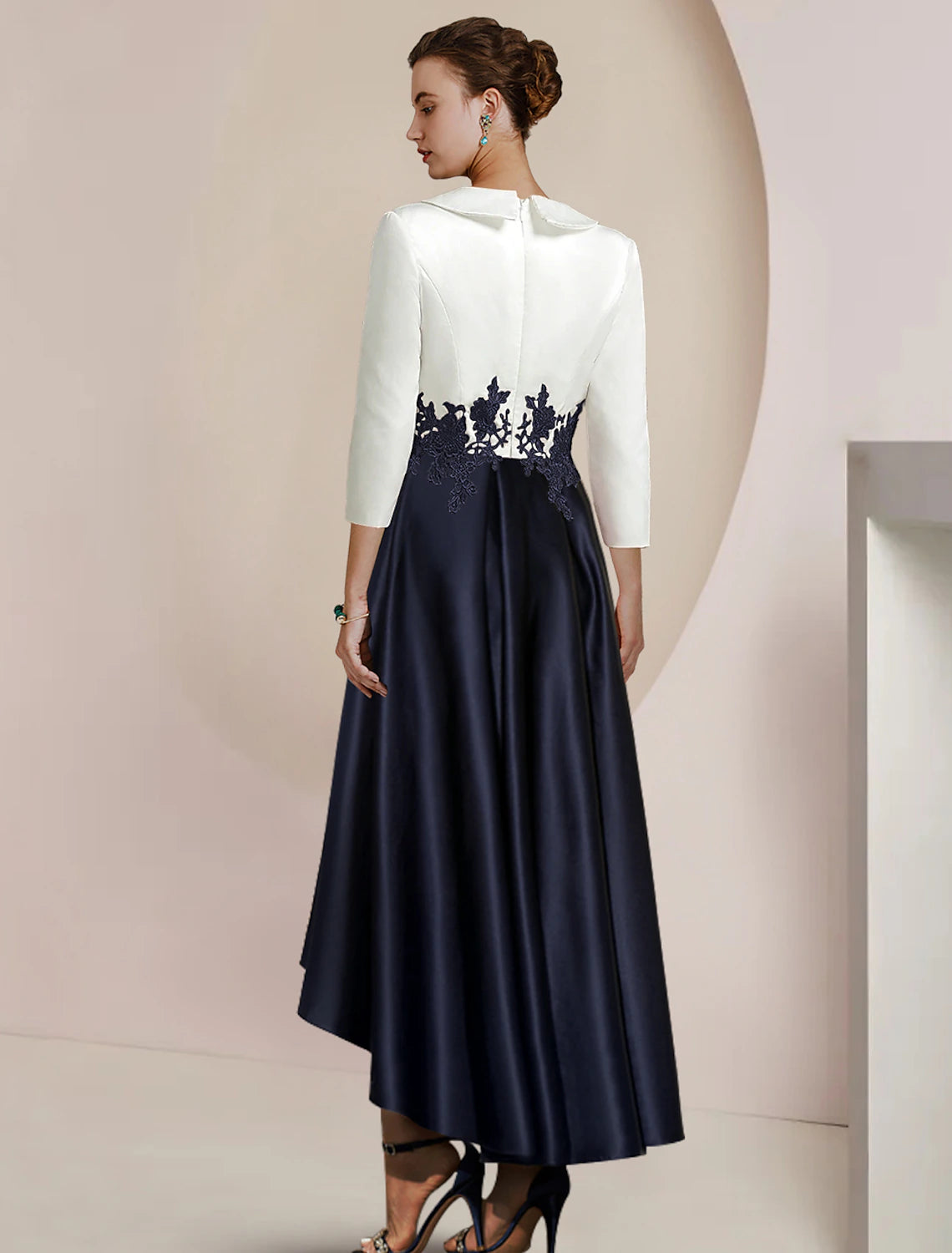 Side view of the A-Line dress, highlighting the high-low asymmetrical hem.