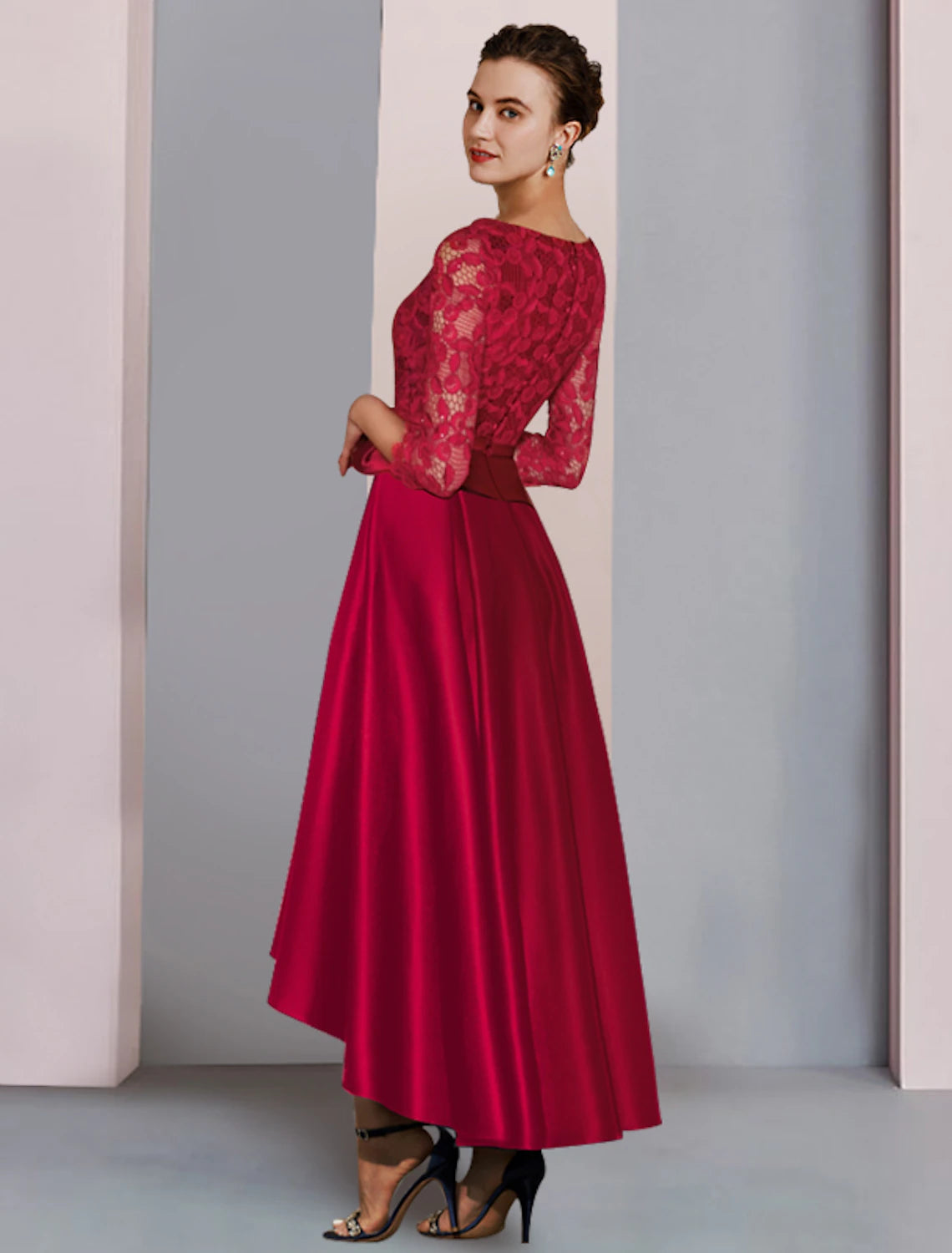 A-line mother of the bride dress from a different angle, showing satin lace and pleat details.