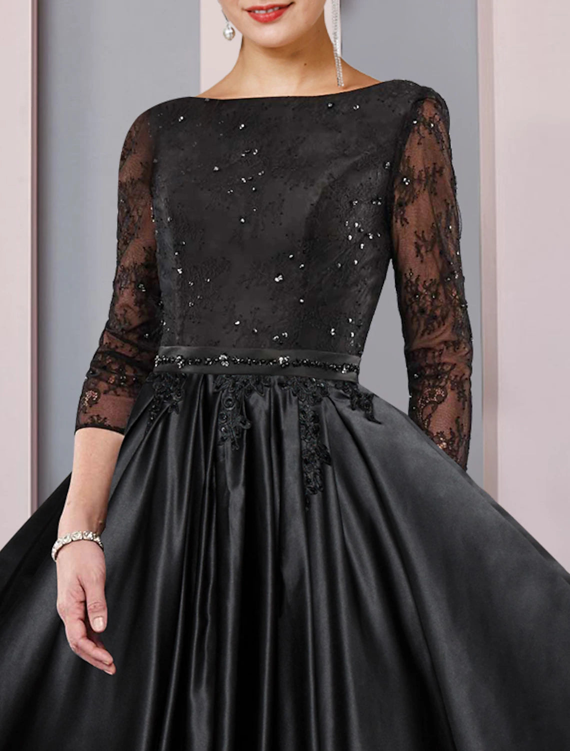 Weitese satin lace dress with a flowing A-line skirt and delicate 3/4 length sleeves.