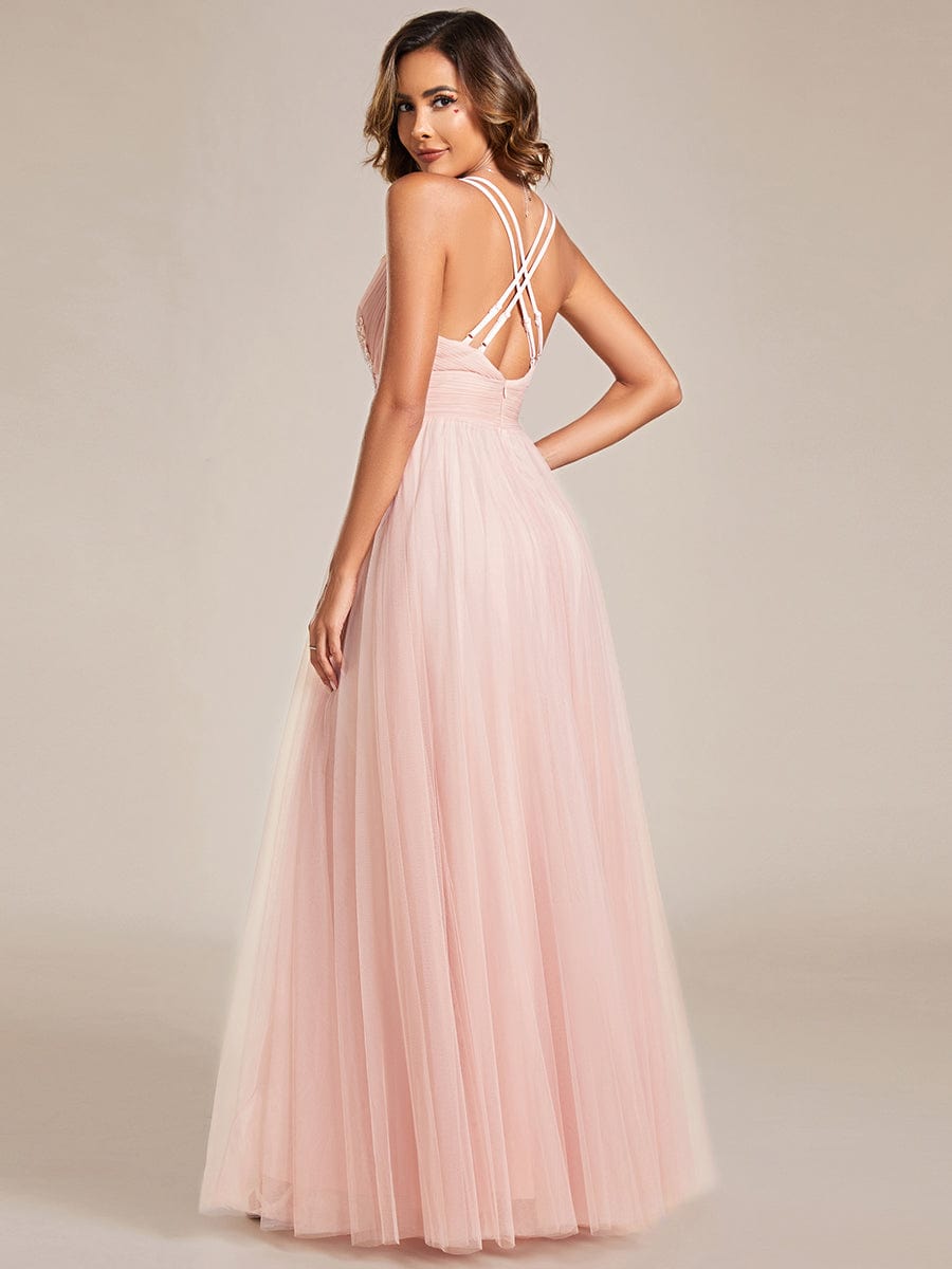 Back view of Weitese pink bridesmaid dress, showcasing elegant cross-back straps.