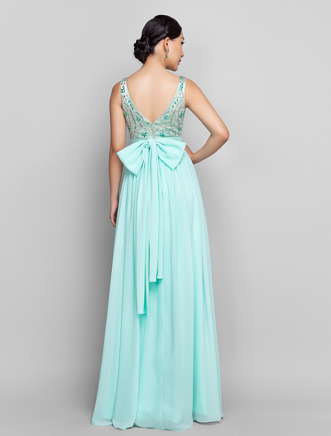 Close-up of the intricate beaded and sequin embellishments on the Weitese A-line dress.
