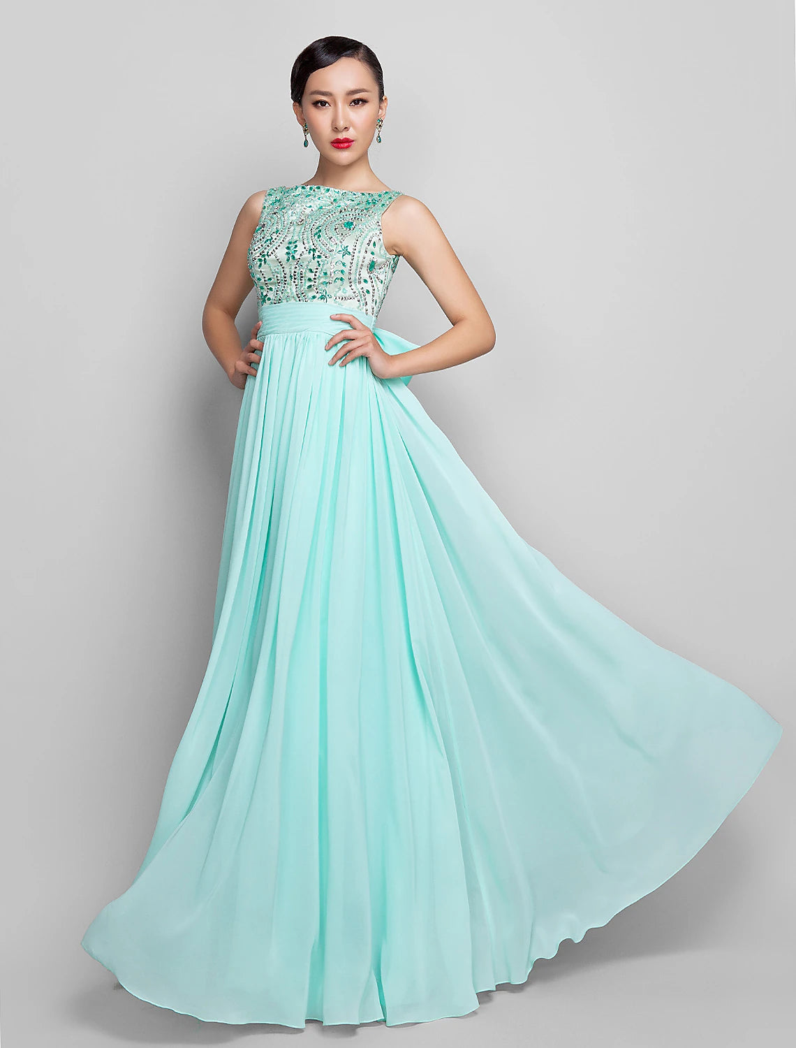 Side view of the elegant A-line scoop neck dress, highlighting its flowing silhouette.
