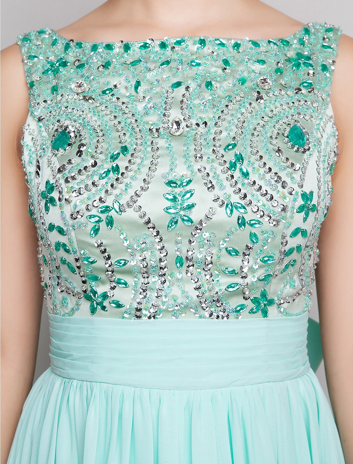 Woman posing in the Weitese A-line beaded dress, showcasing its full length and design.