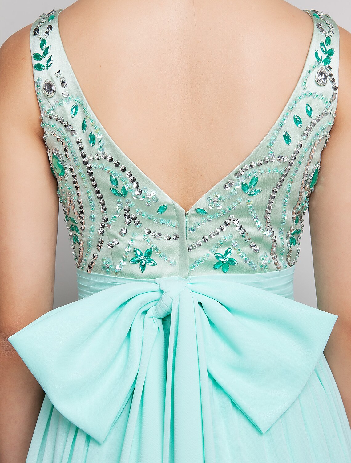 Detail of the ruched bodice and bow accent on the Weitese A-line cocktail dress.