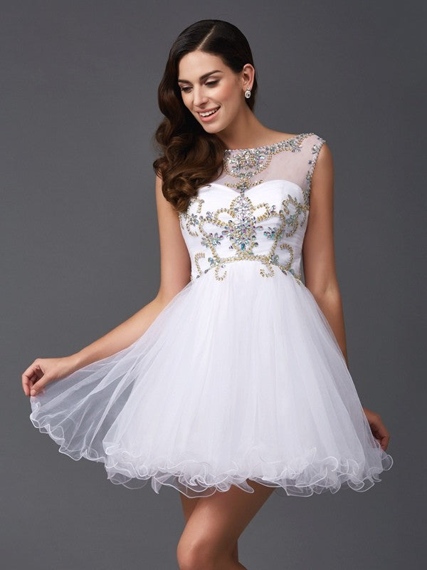Model wearing a light blue A-line short party dress with scoop neck and beaded bodice.