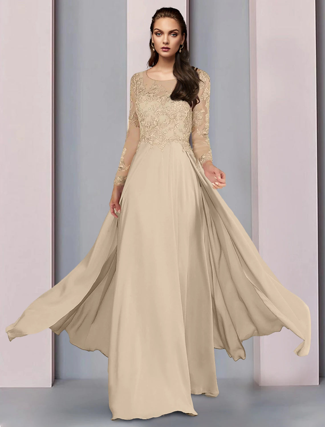 Woman wearing an elegant A-line mother of the bride dress with a scoop neck and half sleeves.