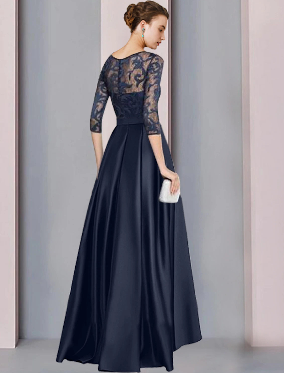 Back view of the Weitese A-line dress, showcasing the asymmetrical high-low hem and delicate lace fabric.