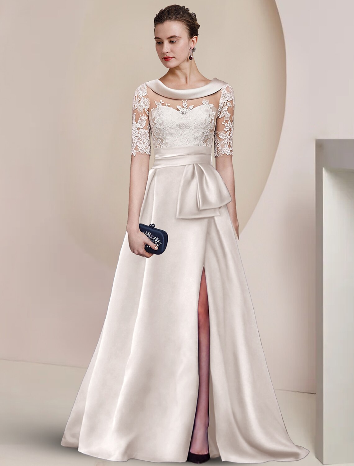 Woman wearing an elegant dark blue A-line mother of the bride dress with scoop neck and half sleeves.