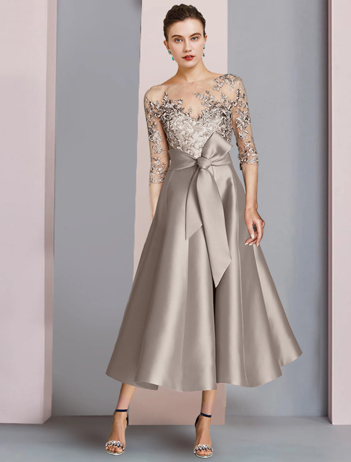 Model wearing a Weitese A-Line tea-length mother of the bride dress with half sleeves and a scoop neck.