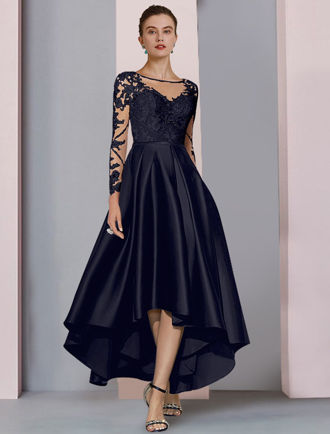 Back view of the Mother of the Bride dress showing lace details.
