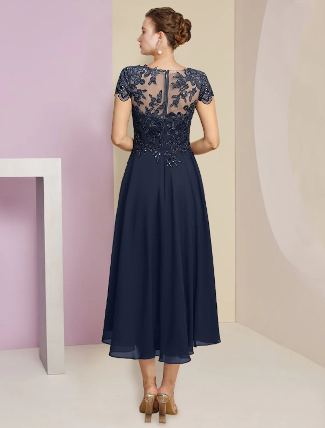Back view of the two-piece A-line dress with a matching wrap.
