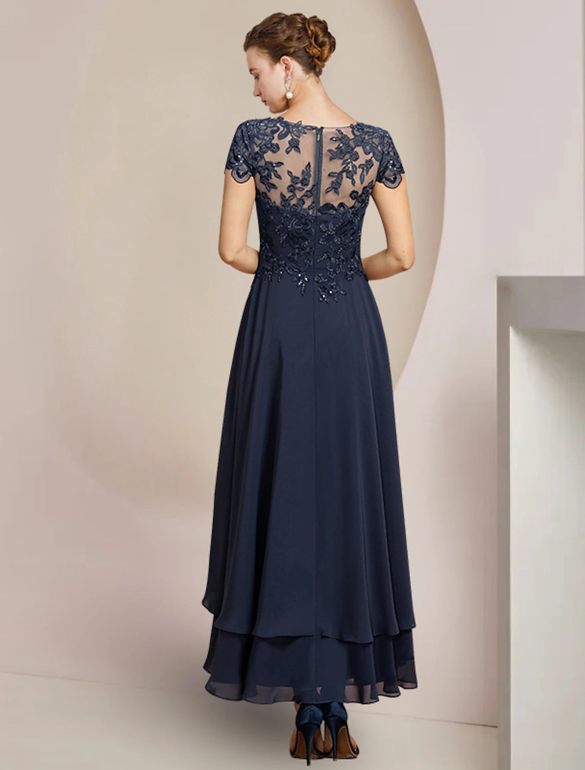 Side view of high-low asymmetrical chiffon lace dress for wedding guests.