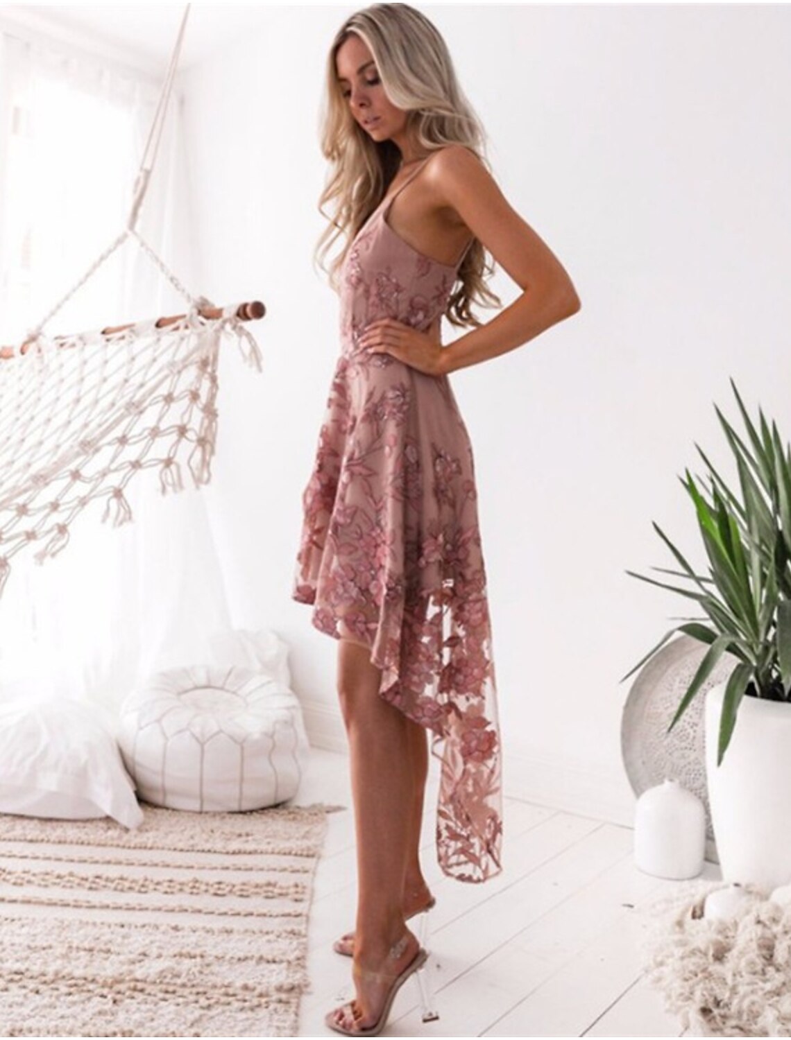 Back view of the Weitese A-Line floral cocktail dress, showcasing its elegant silhouette and asymmetrical design.
