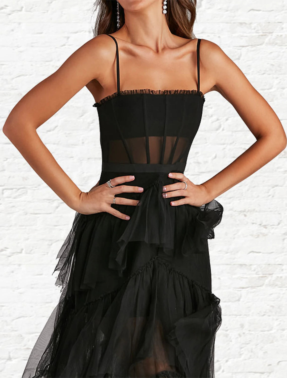 Full-length view of a model posing in a pure color A-line evening dress.