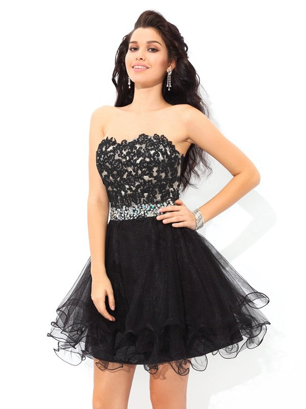 Model wearing a Weitese A-Line sweetheart applique short satin cocktail dress.