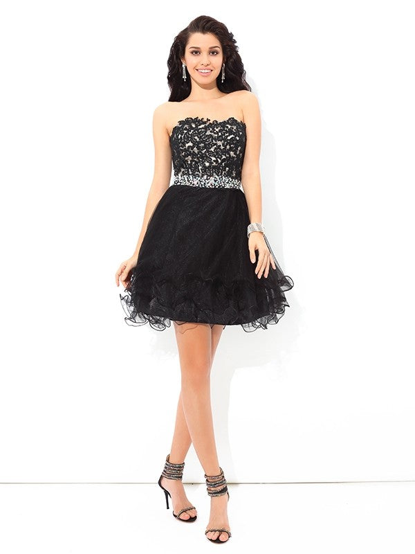 Back view of the elegant short satin cocktail dress with A-line silhouette.