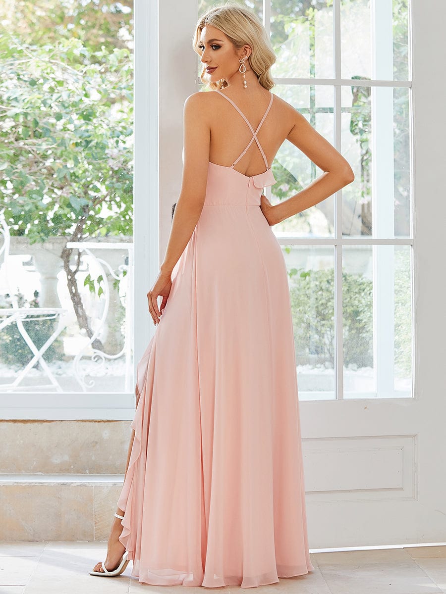 Side view of a pink chiffon bridesmaid dress, showcasing the elegant front slit.