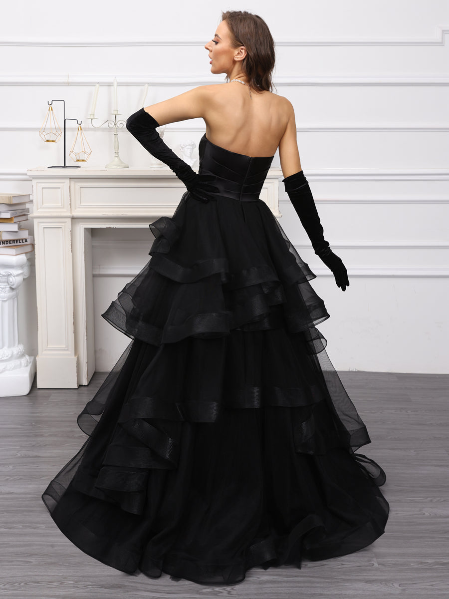 Side view of the flowing A-line tulle wedding gown.