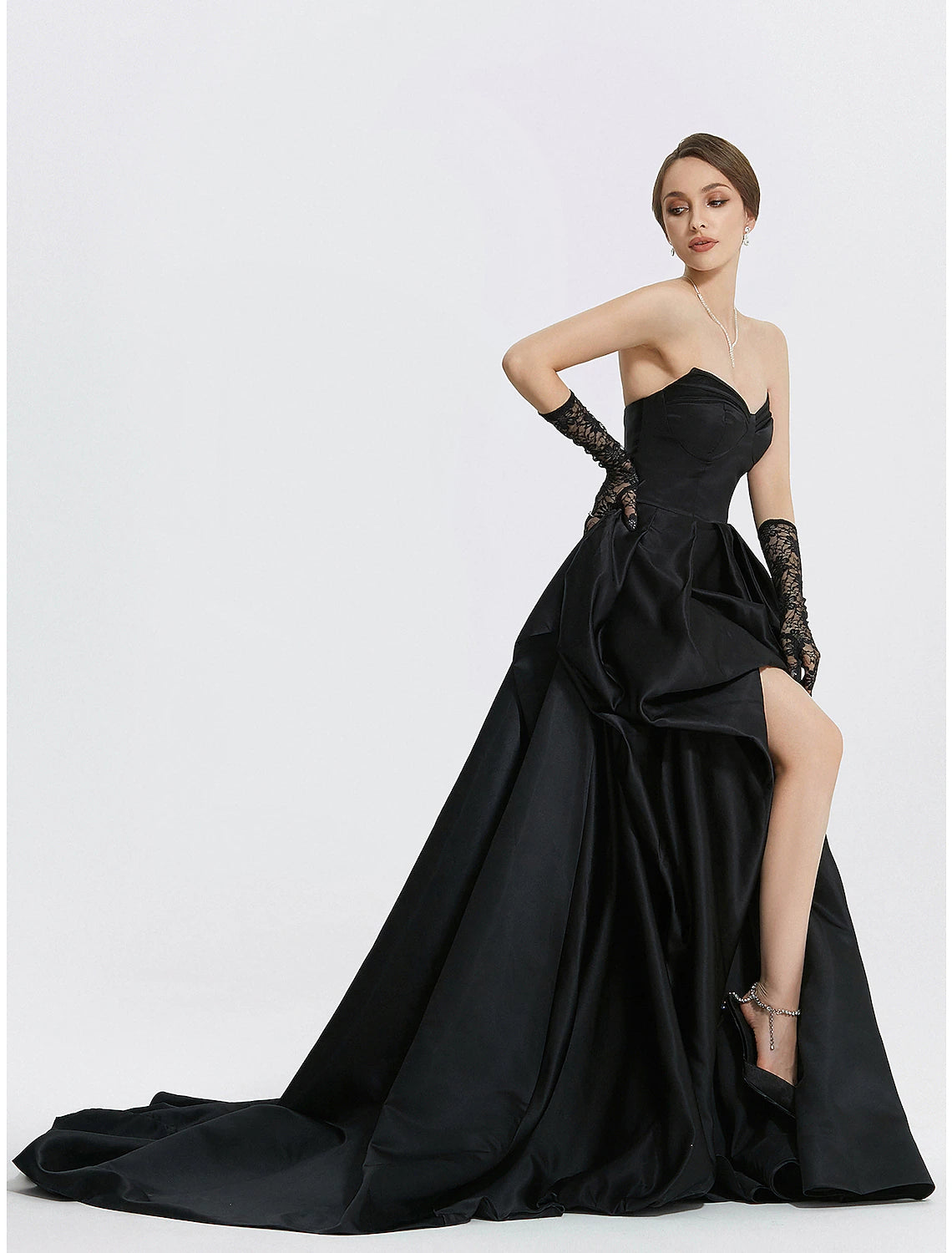 Full length view of woman posing in the Weitese A-Line evening gown.