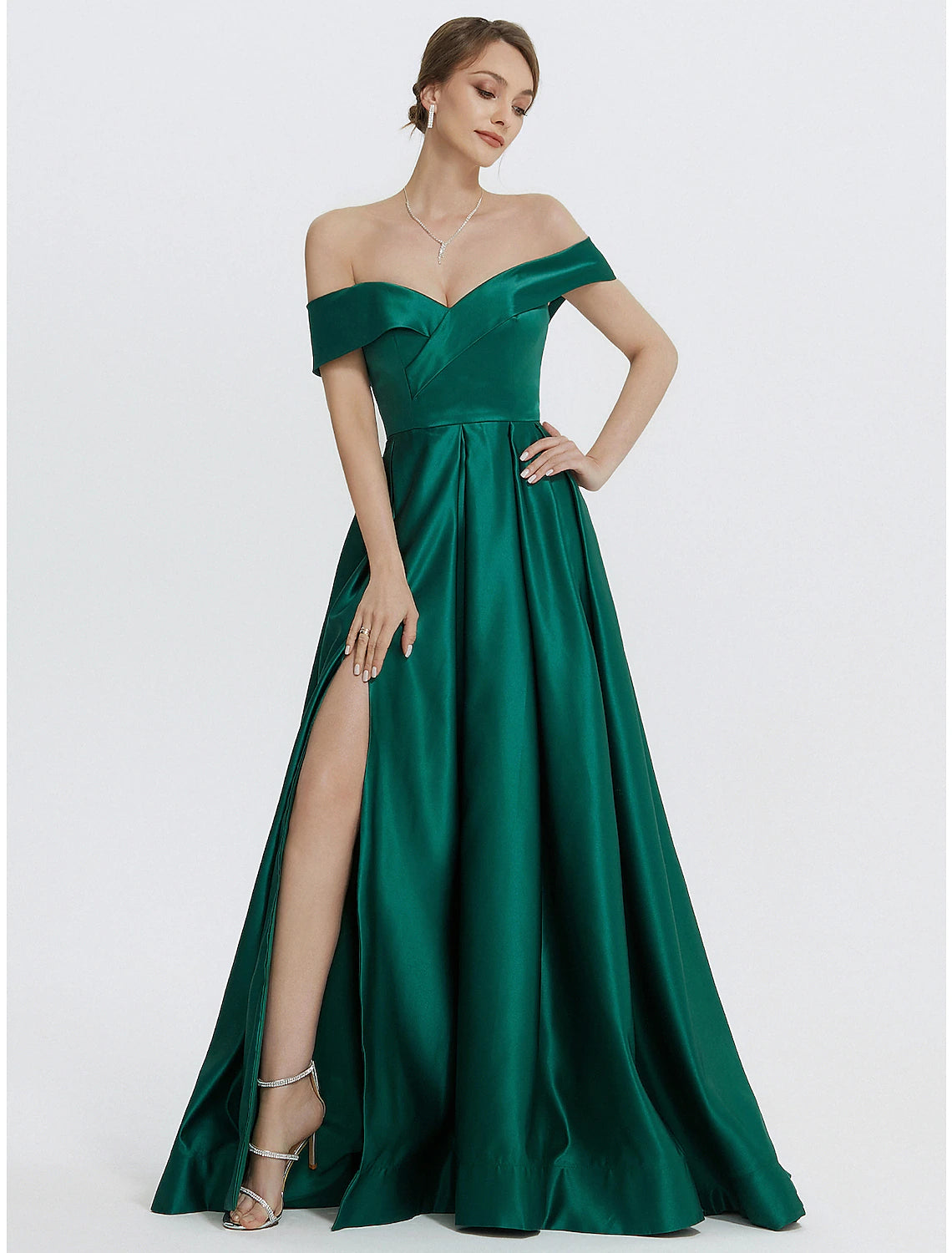 Close-up of the sweetheart neckline and bodice of the red satin A-line gown.