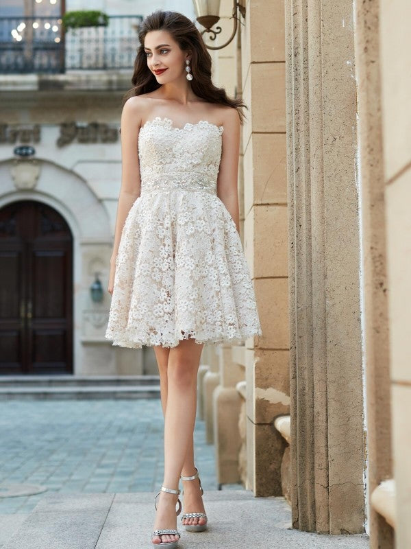 Close-up of the sweetheart neckline and rhinestone embellishments on the Weitese lace mini dress.