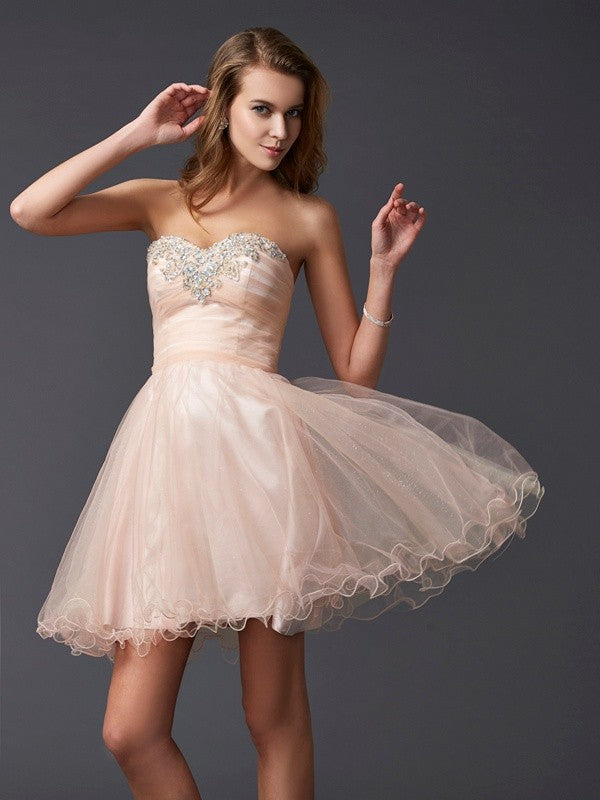 Model wearing a Weitese A-line sweetheart short silk-like satin homecoming dress, front view.