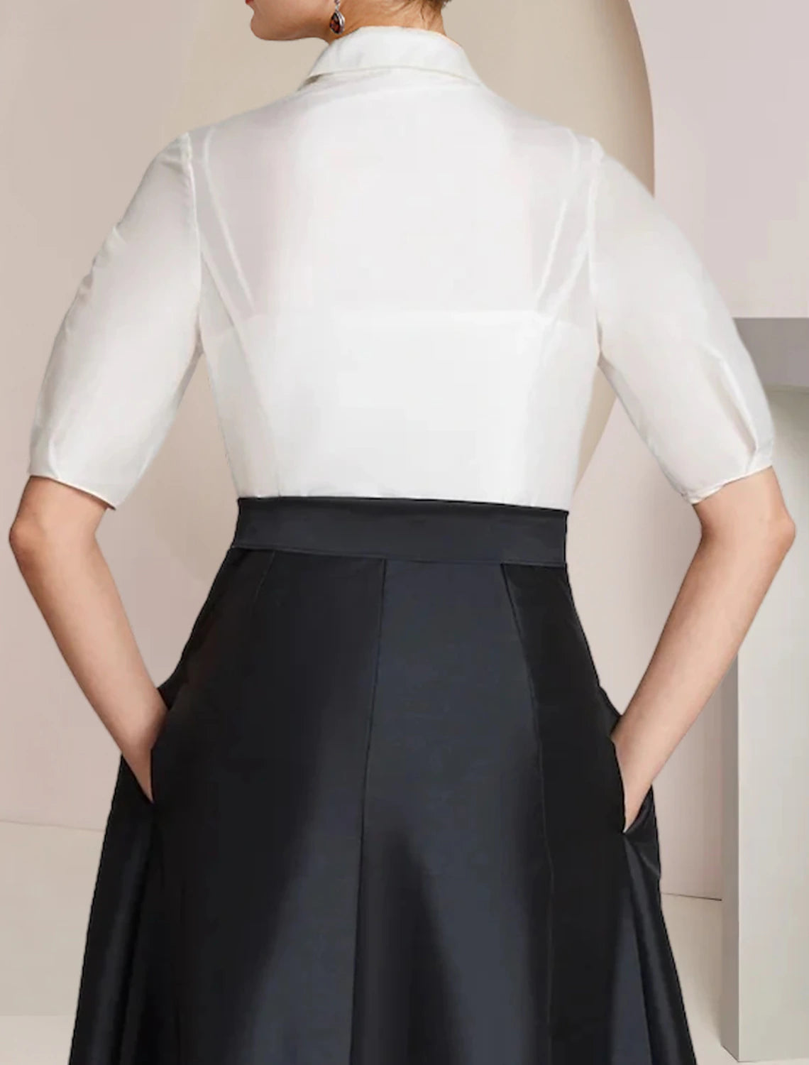 Model gracefully walking in the Weitese A-Line color block dress.