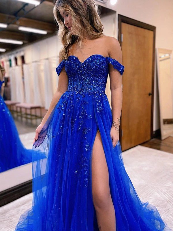 Back view of the off-shoulder tulle gown with intricate applique design.