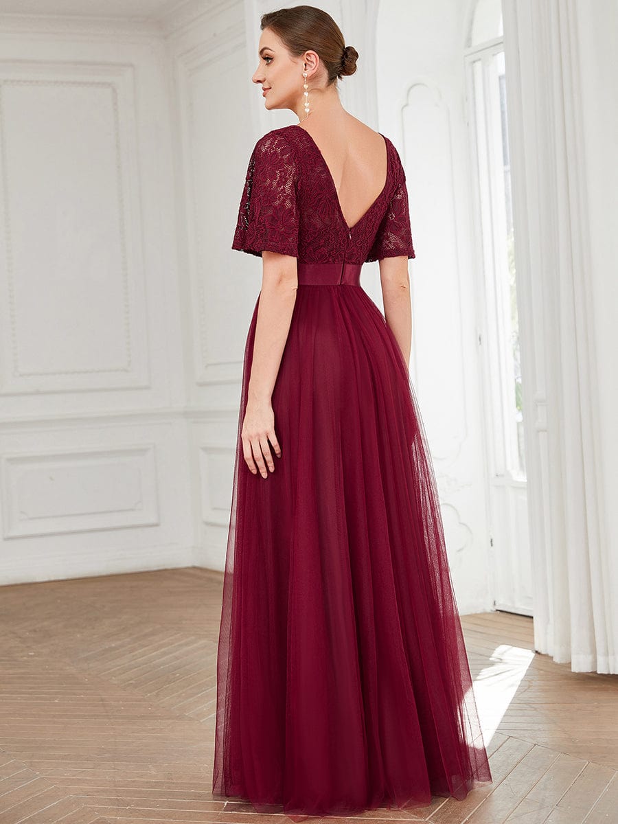 Bridesmaid dress with short sleeves and backless design, side view.