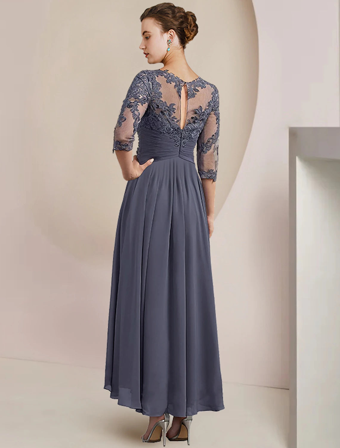 Back view of the elegant A-Line two-piece mother of the bride dress.